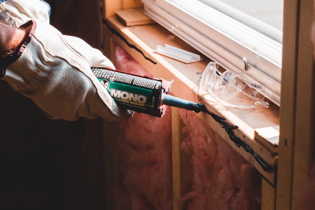 Sealing and finishing a window frame during a home remodel